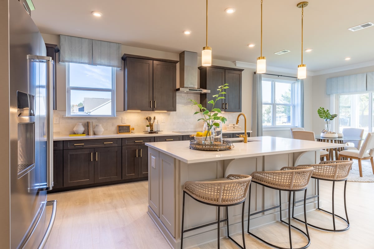 kitchen with a center island and barstools